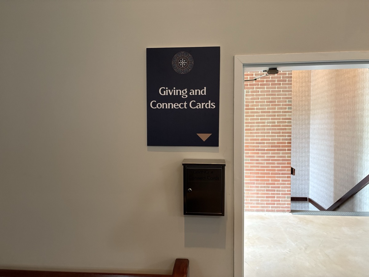 Giving and connect card boxes in the church lobby